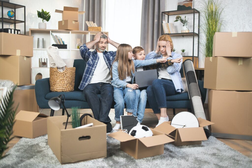 Caucasian family preparing stuff for relocation